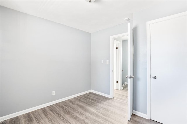 empty room featuring light hardwood / wood-style floors