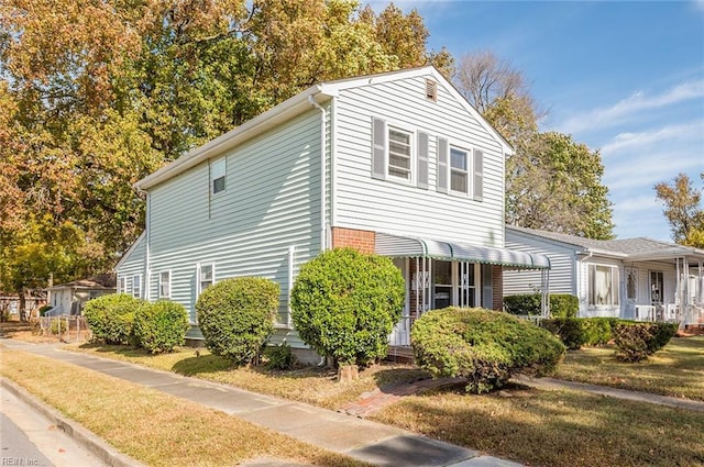 view of property exterior with a yard