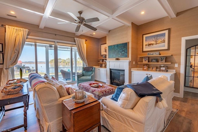 living room with french doors, coffered ceiling, beamed ceiling, hardwood / wood-style flooring, and ceiling fan