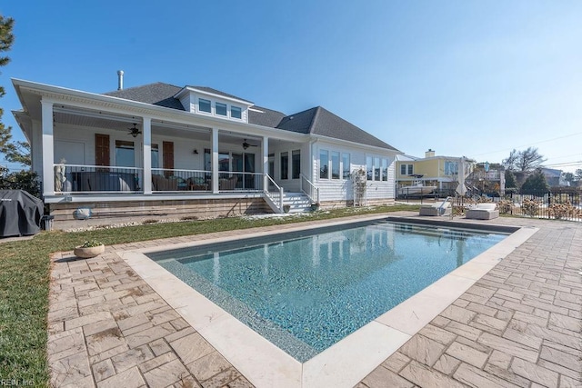 back of house featuring a patio area and ceiling fan