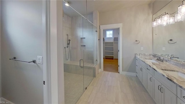 bathroom featuring vanity and walk in shower