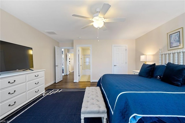 bedroom with dark wood-type flooring and ceiling fan