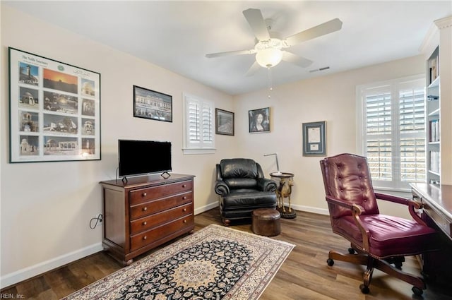 office space featuring hardwood / wood-style floors and ceiling fan