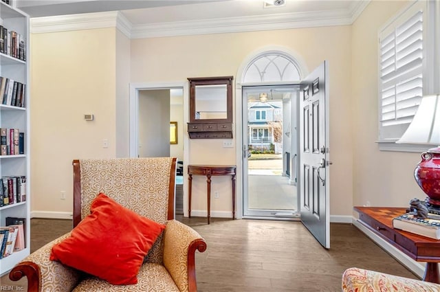 interior space with ornamental molding and wood-type flooring