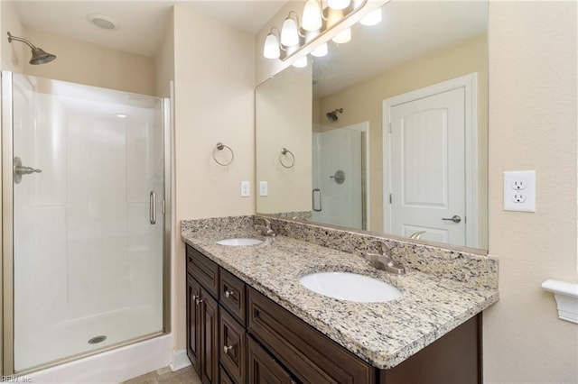 bathroom featuring vanity and walk in shower