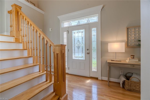 entrance foyer with light hardwood / wood-style floors