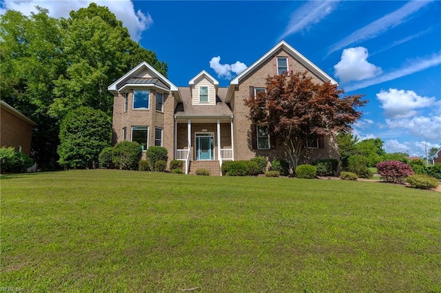 view of front of property with a front lawn