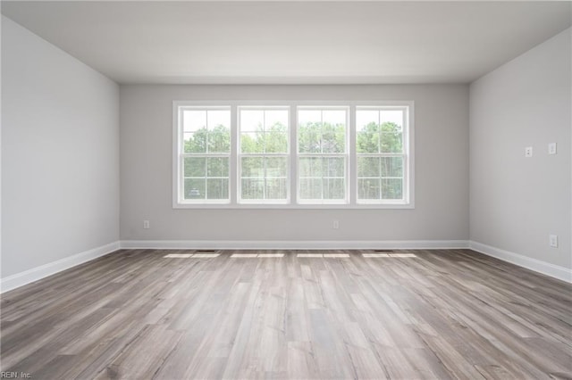 empty room featuring light hardwood / wood-style floors