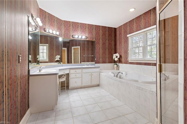 bathroom with vanity, tile patterned floors, and plus walk in shower