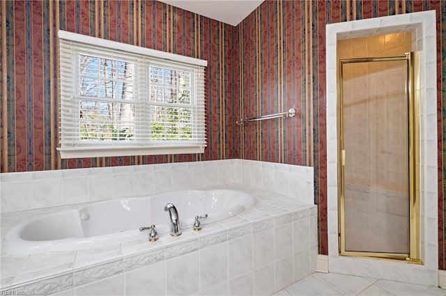 bathroom featuring independent shower and bath and tile patterned floors