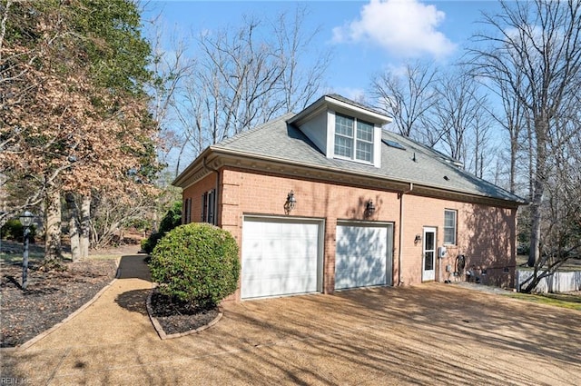 view of property exterior featuring a garage