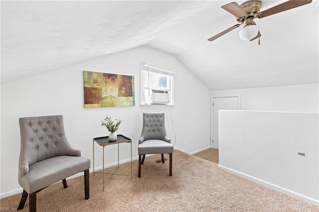 sitting room featuring lofted ceiling, cooling unit, light carpet, and ceiling fan