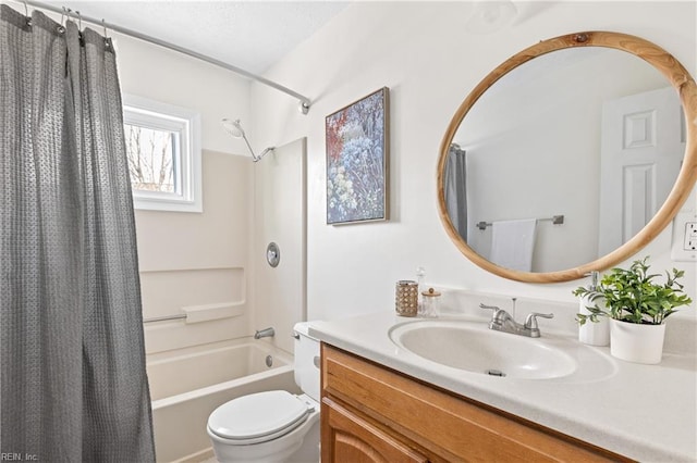 full bathroom with vanity, shower / bath combination with curtain, and toilet