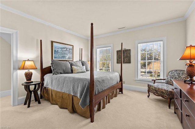 carpeted bedroom with ornamental molding