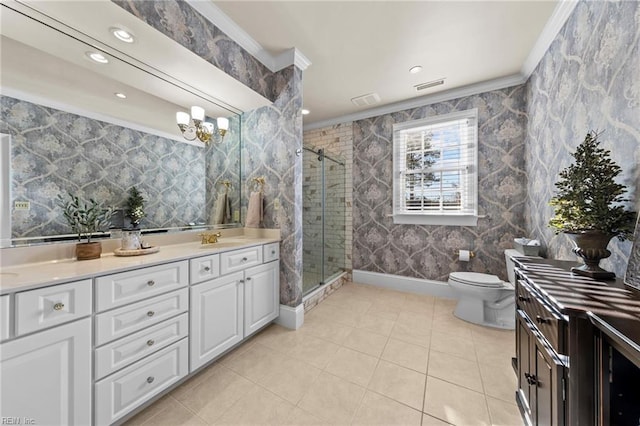 bathroom with crown molding, an inviting chandelier, vanity, an enclosed shower, and toilet