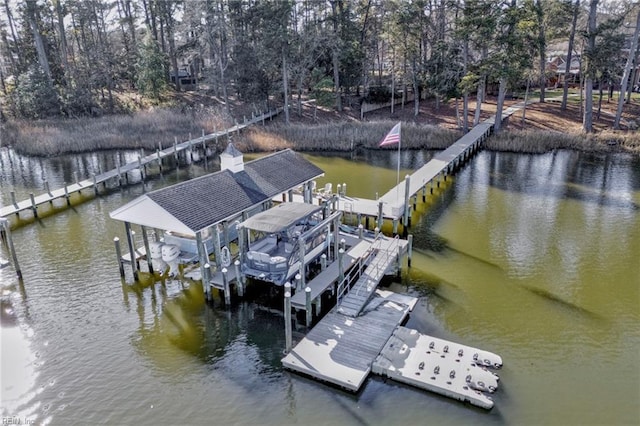 view of dock with a water view