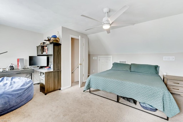 bedroom with light carpet, lofted ceiling, and ceiling fan