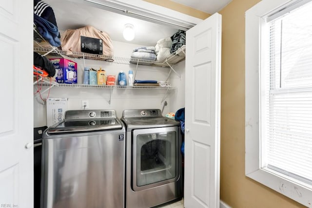 laundry room with washer and clothes dryer