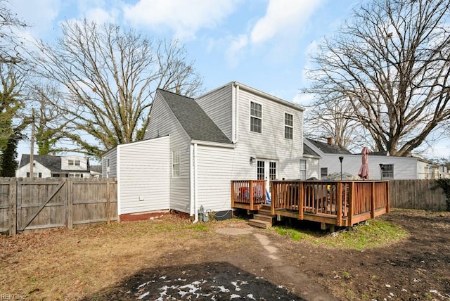 rear view of house with a deck