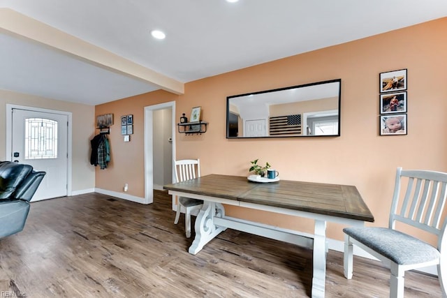 dining space featuring hardwood / wood-style floors and breakfast area