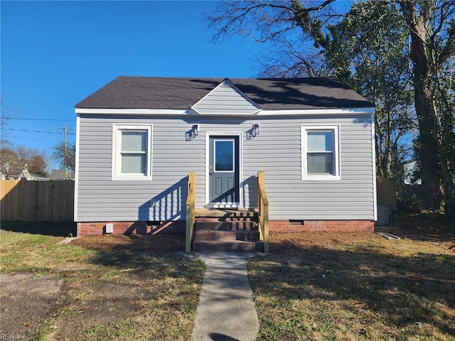 view of front of home with a front yard