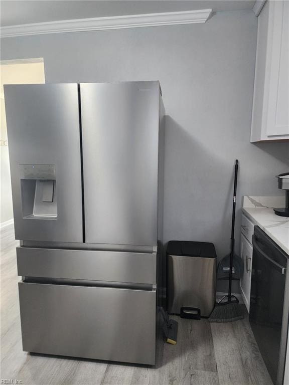 room details featuring dishwasher, white cabinets, ornamental molding, stainless steel refrigerator with ice dispenser, and light wood-type flooring