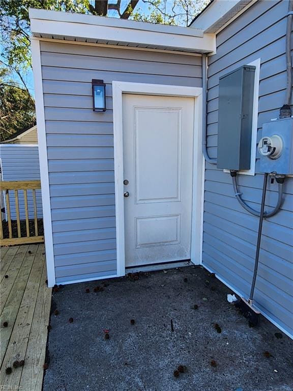 doorway to property with a deck