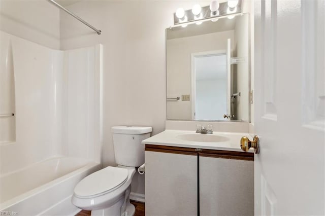 full bathroom with vanity, shower / bathtub combination, and toilet