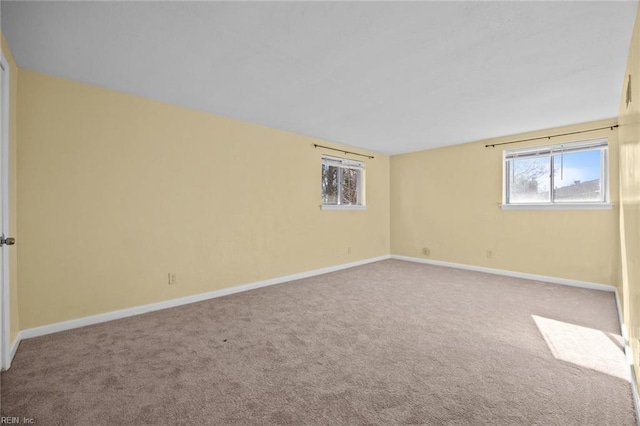 unfurnished room with carpet flooring