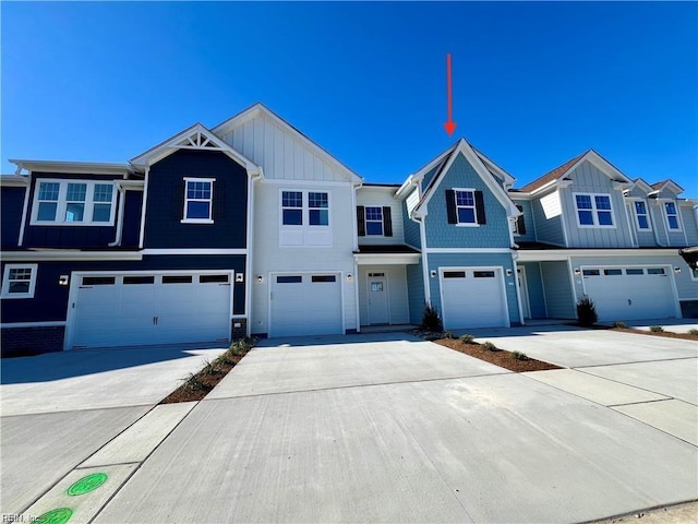 townhome / multi-family property featuring a garage