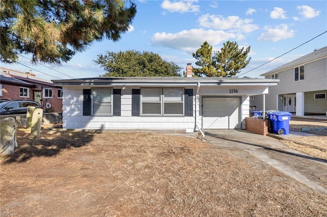 ranch-style home with a garage