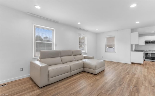 living room featuring light hardwood / wood-style floors