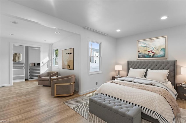 bedroom featuring light hardwood / wood-style floors