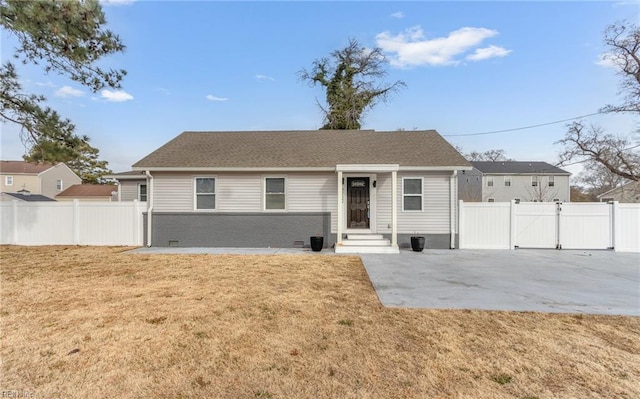 single story home with a front lawn and a patio