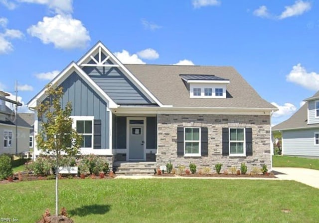 craftsman-style home with a front lawn