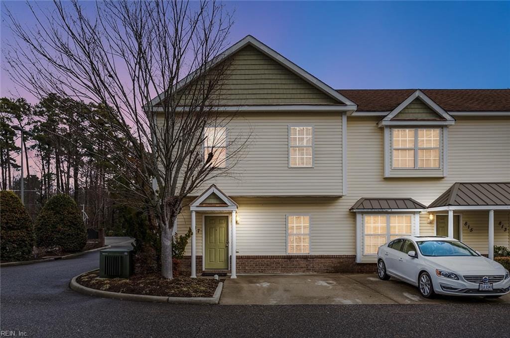 view of front of property with central AC