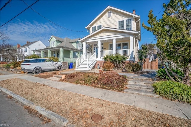 view of front of property featuring covered porch