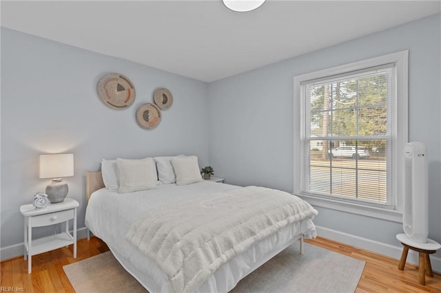 bedroom featuring hardwood / wood-style flooring