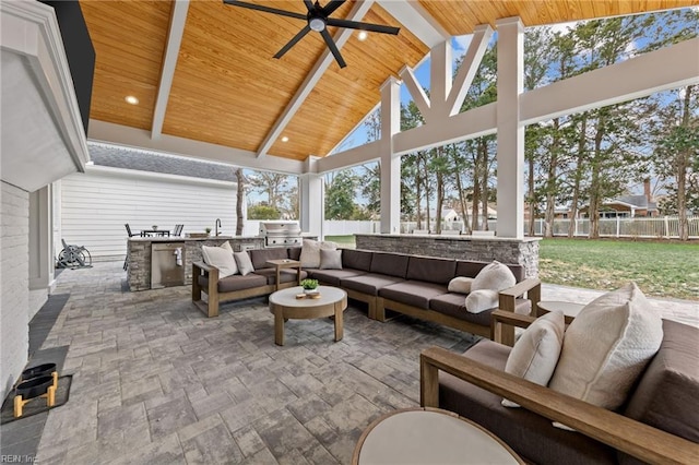 view of patio featuring sink, ceiling fan, a gazebo, area for grilling, and an outdoor hangout area