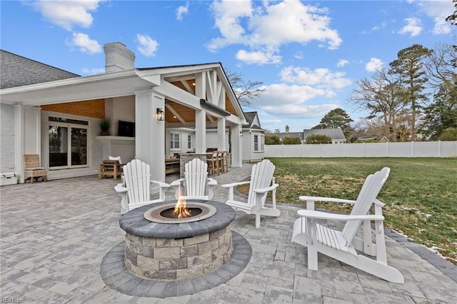 view of patio featuring a fire pit