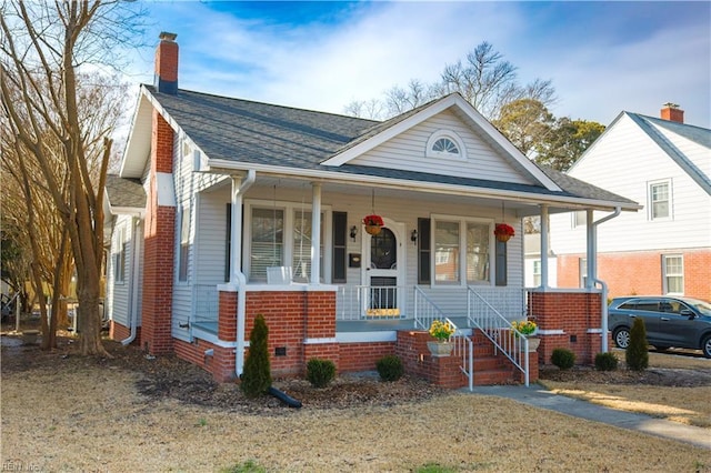 bungalow-style home with a porch