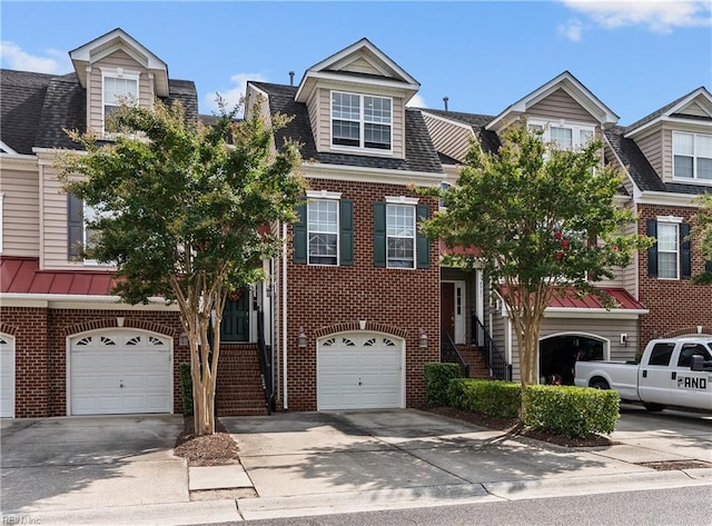 view of front of property with a garage