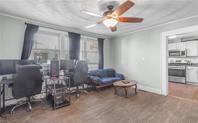 home office with crown molding, a healthy amount of sunlight, and dark hardwood / wood-style flooring