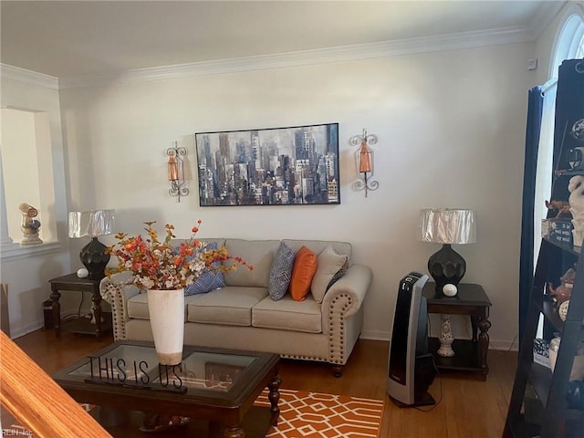 living room with hardwood / wood-style flooring and ornamental molding