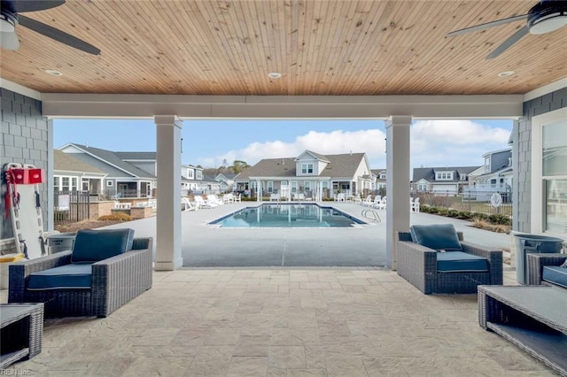 view of pool featuring a patio area and ceiling fan