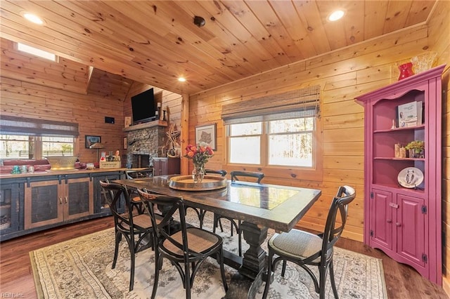 dining space featuring wood ceiling, a wealth of natural light, vaulted ceiling, and hardwood / wood-style flooring