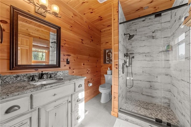 bathroom featuring toilet, an enclosed shower, wooden ceiling, vanity, and tile patterned flooring