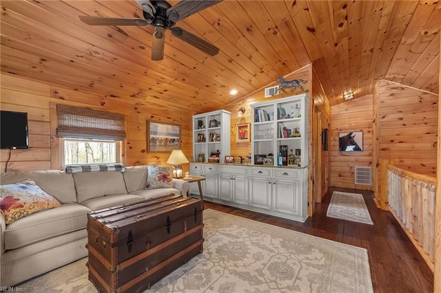 living room featuring lofted ceiling, wooden ceiling, wooden walls, hardwood / wood-style flooring, and ceiling fan