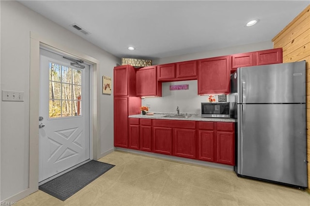 kitchen with appliances with stainless steel finishes and sink