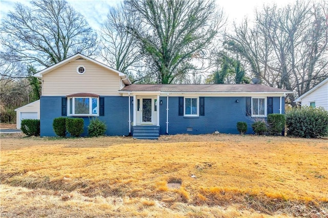 ranch-style home with a front lawn